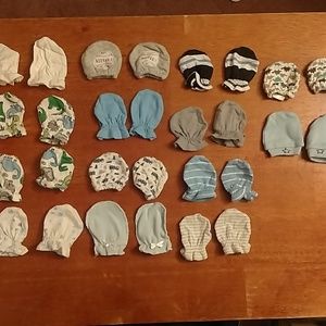 14 pairs of baby mittens